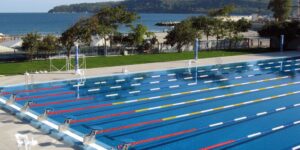 swimmers eating healthy snacks poolside
