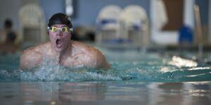 young swimmers healthy eating poolside