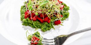 swimmer in action in a pool with healthy food