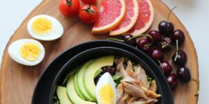 swimmer eating healthy meal poolside